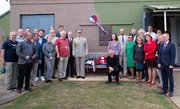 Unveiling of the Czech four-leaf clover memorial plaque at the Museum, with Czech and British guests