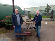 Part of the Rolls-Royce cylinder head from F/O Walerian &Zdot;ak&rsquo;s Hurricane V7289 of 303 Squadron, being handed over at the Museum