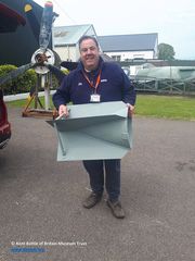 Martin Reilly holding the first of the eight SC250 German bomb fins he is fabricating for the Museum