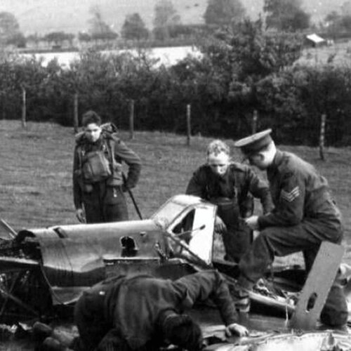 British soldiers examining the remains of a Luftwaffe Messerschmitt Me 109.