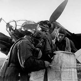 Luftwaffe He 111 crew pre-flight route discussion.