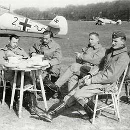 Luftwaffe pilots relaxing in France between operational flights. Luftwaffe pilots relaxing in France between operational flights.