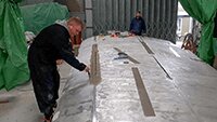 16 February 2020, volunteers Clint and Julian repairing wing panels.