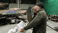 Dave Brocklehurst MBE and Dave Hertz studying the camouflage plan.