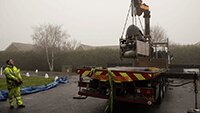 Offloading prop-spinners and other items.