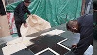 Dave Brocklehurst and Julian carefully removing the masking from the second upper wing Balkan Cross.