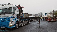 Darren Scott of Scott's Transport, arrives with his HIAB crane to lift the fuselage off the Welch's transporter.