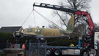 Preparing to lift over the museum compound fence