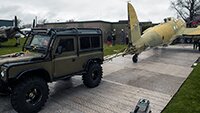 Towing the fuselage into position across the temporary track.