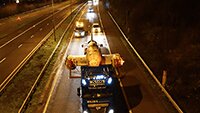 The Heinkel, Welch's support vehicles, Essex Police vehicles on route down from Duxford. Photo © Martin Reilly