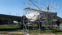 The team from Access Solutions Kent Scaffolding Services, erecting a temporary covering over the fuselage section.