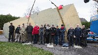 Its huge! Museum volunteers and Welch's drivers stand along the front of the wing to give an idea as to its size.