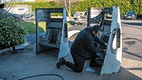 Julian Richardson helps with final preparation of the engine cowlings before re-painting.