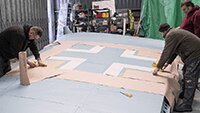 Masking up so the black areas of the Balcan cross can be painted.