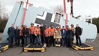 The Big Wings Roll Over successfully accomplished! Museum volunteers, Darren Scott and the Search and Rescue team from Kent Fire Brigade who all helped with fliping the two wings.