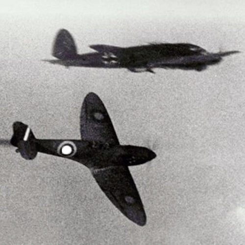Spitfire loosing its battle with a Heinkel III.