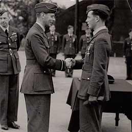 DFC awarded to P/O John Allen from King George VI. DFC awarded to P/O John Allen from King George VI.