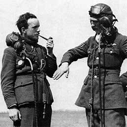RAF pilots discussing an aerial combat. RAF pilots discussing an aerial combat.